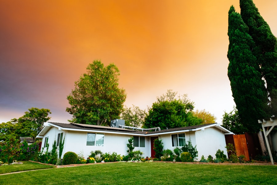 A welcoming single-story home surrounded by mature trees